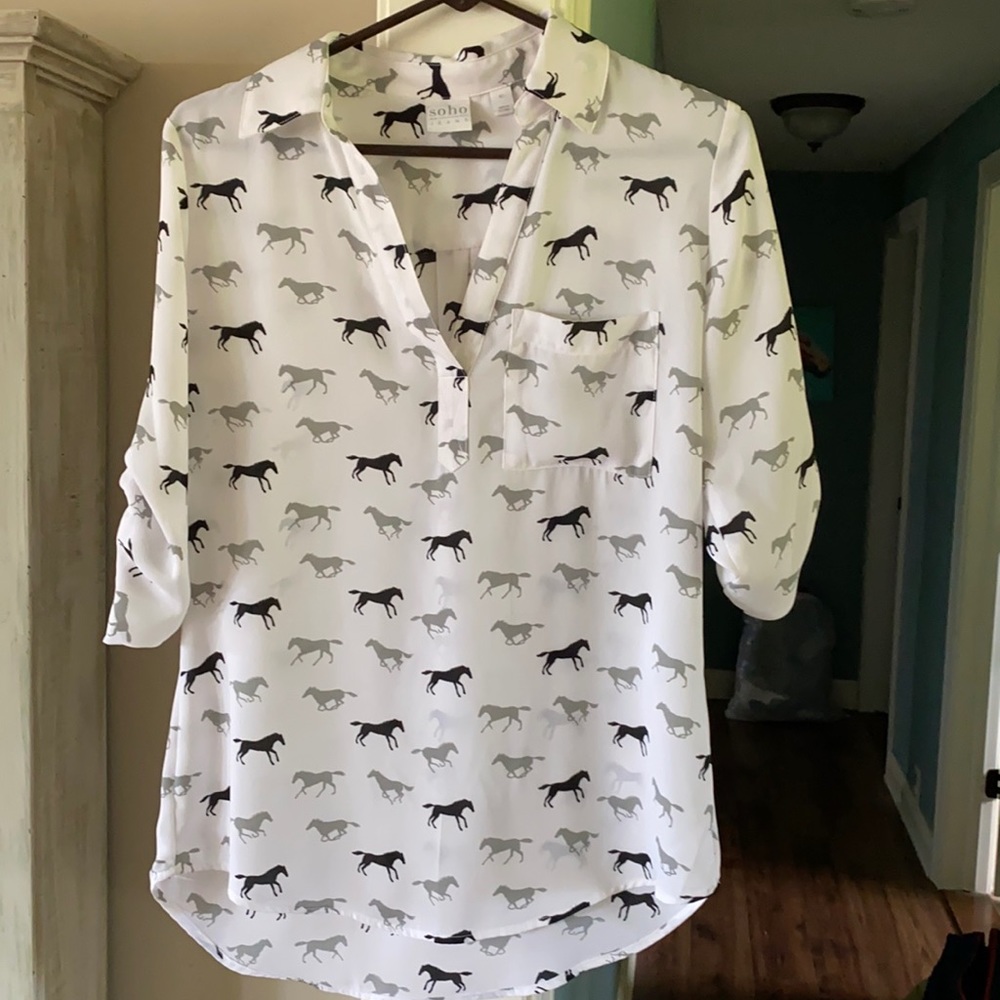 Women’s blouse with horse print.